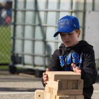 Little boy playing Jenga